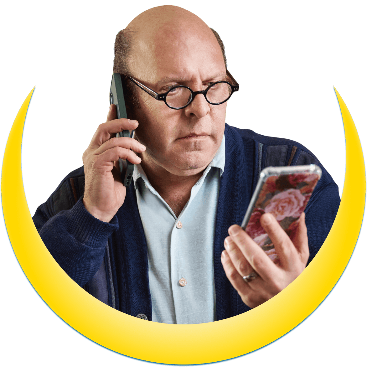 A man holding a phone to his ear and another in his hand